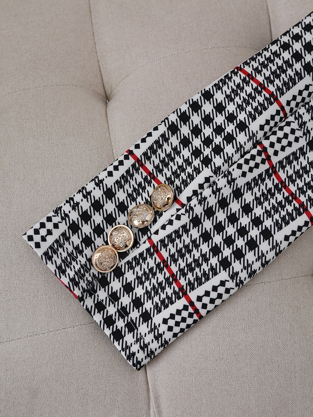 Plaid blazer and high-waist skirt styled together