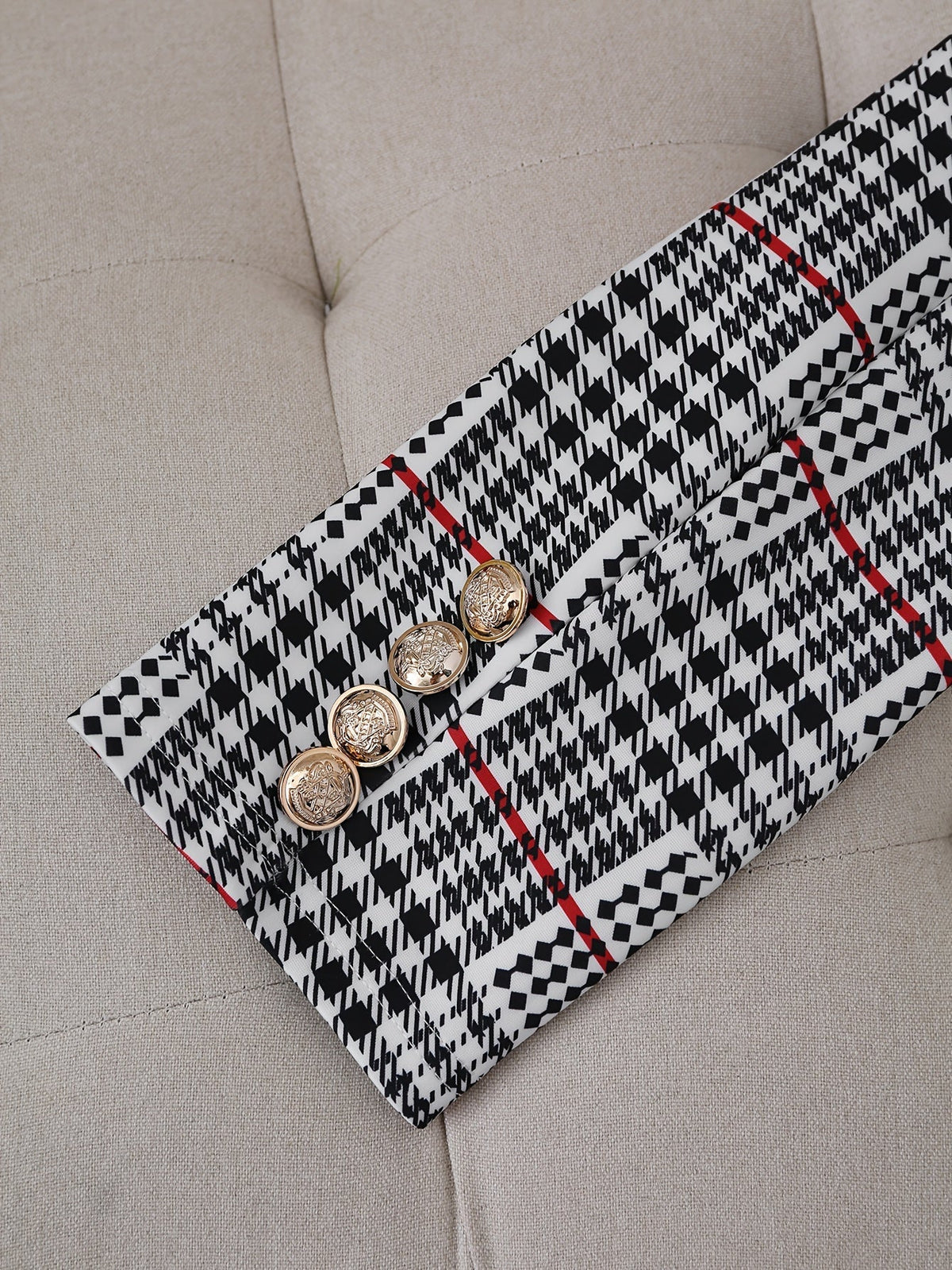 Plaid blazer and high-waist skirt styled together