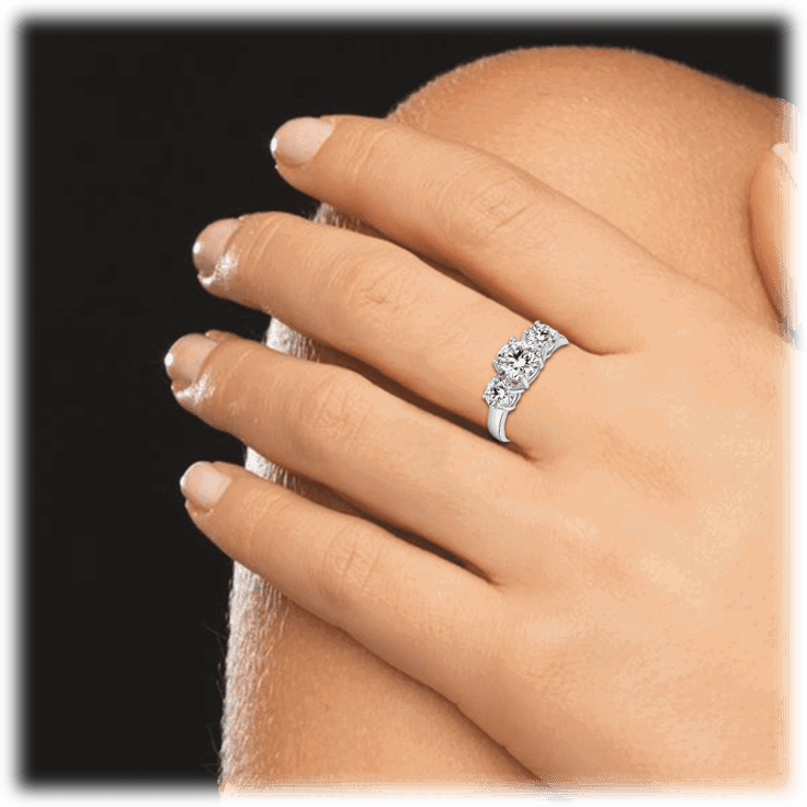 Three stone halo cubic zirconia ring in silver-tone finish