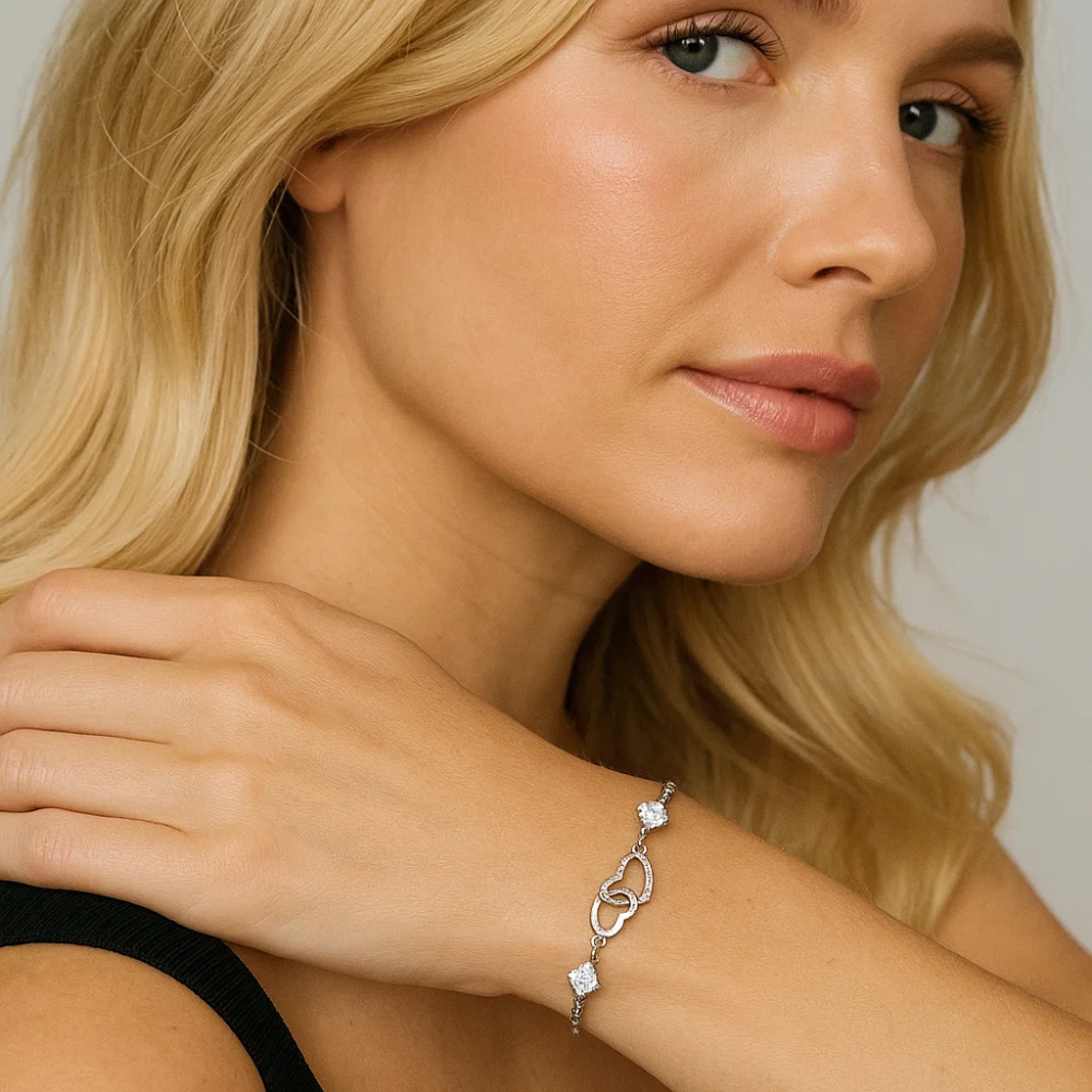 Double-heart bracelet with clear cubic zirconia accents