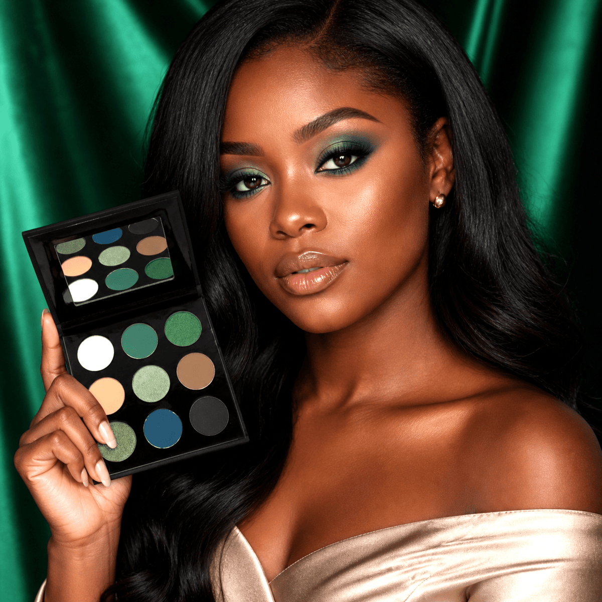 Model wearing a jewel-toned eye look created with the JADED eyeshadow palette