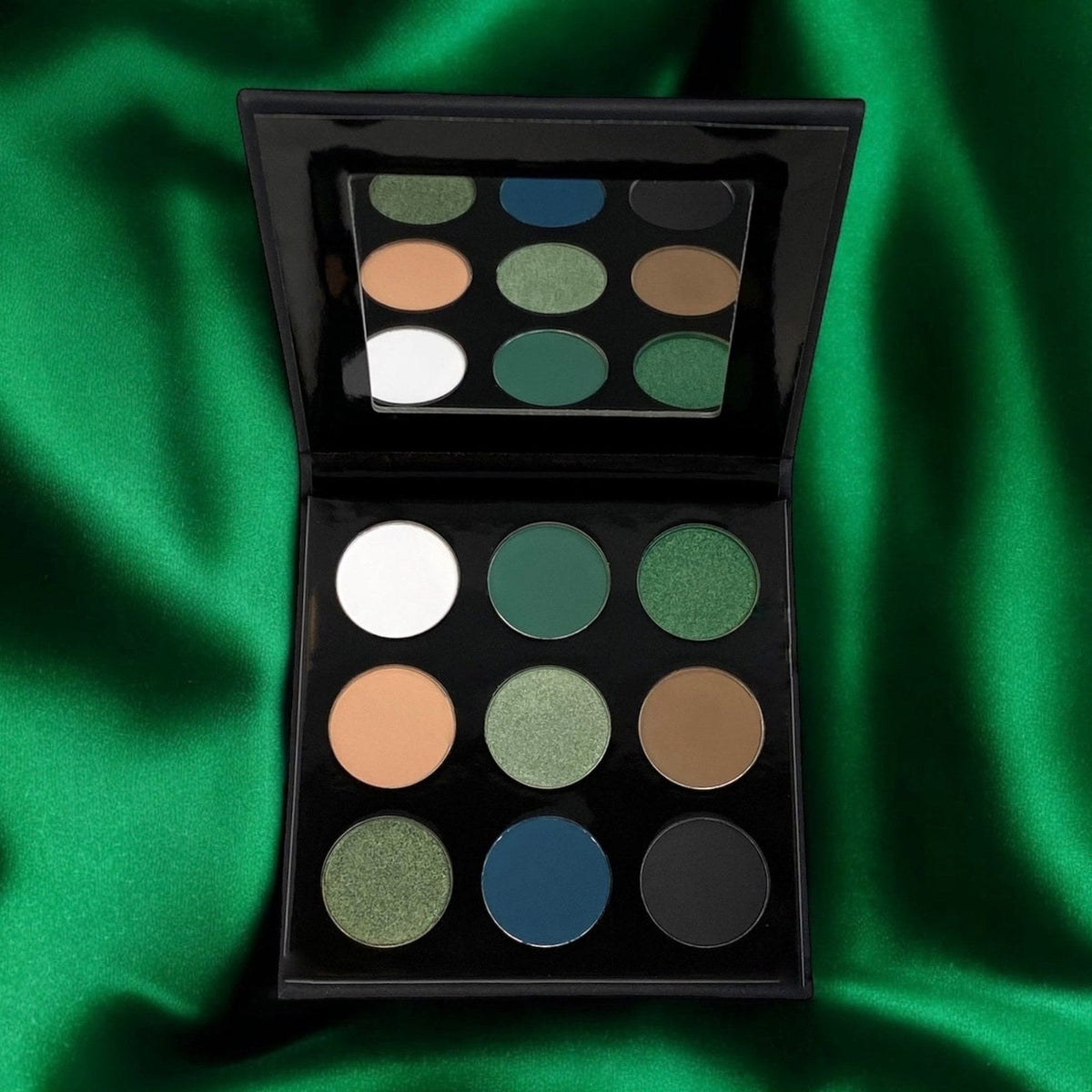 Open JADED eyeshadow palette with green, blue, neutral, matte and shimmer shades