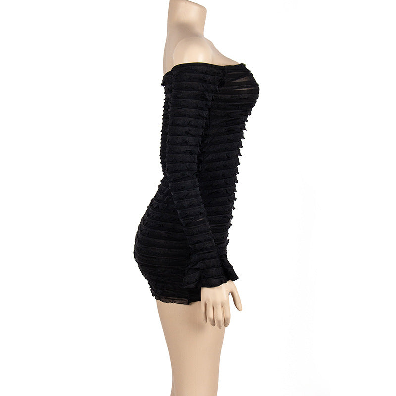 Side view of black ruched off-shoulder mesh mini dress on mannequin