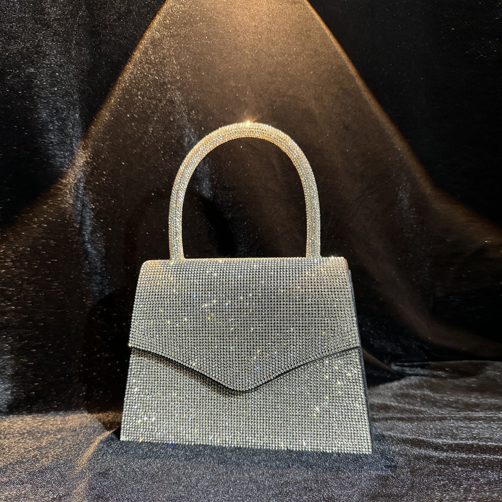 Silver rhinestone clutch bag detail
