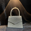 Silver rhinestone clutch bag detail