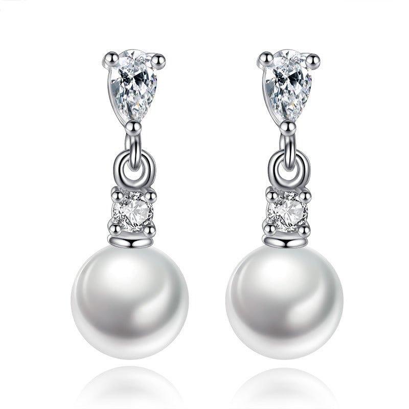 Pearl drop earrings with cubic zirconia accents