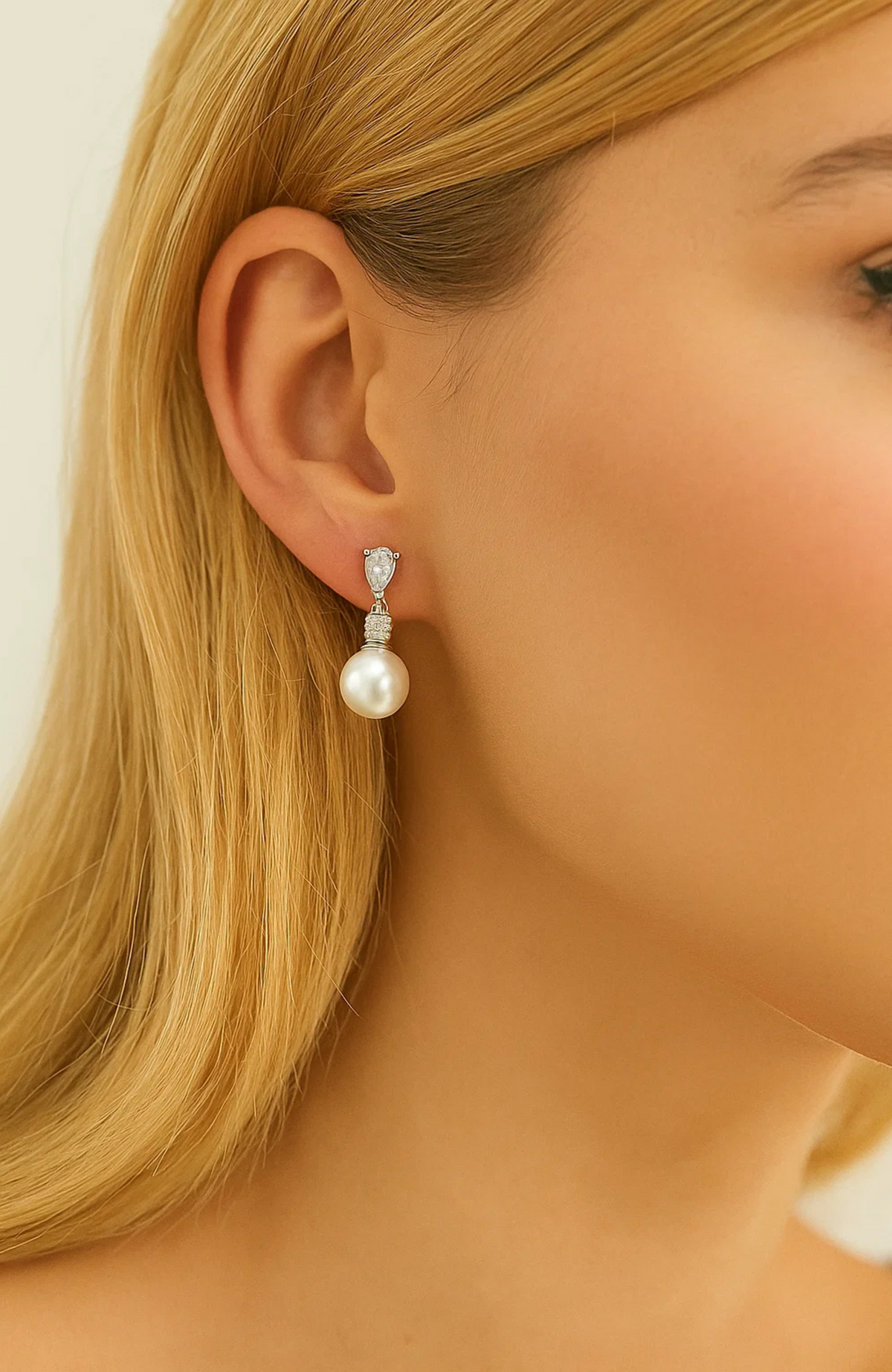 Pair of pearl drop earrings with cubic zirconia accents