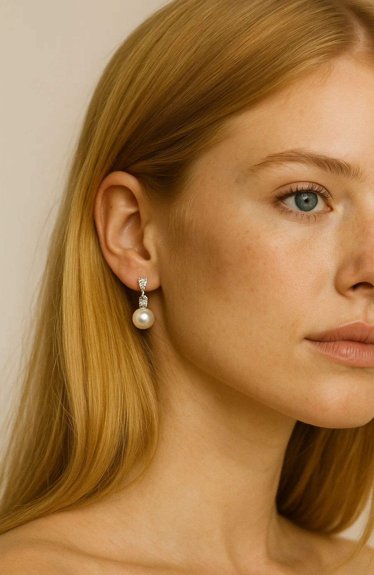 Pearl drop earrings with polished plated setting