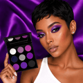 Model wearing a purple eye look created with the REIGN eyeshadow palette