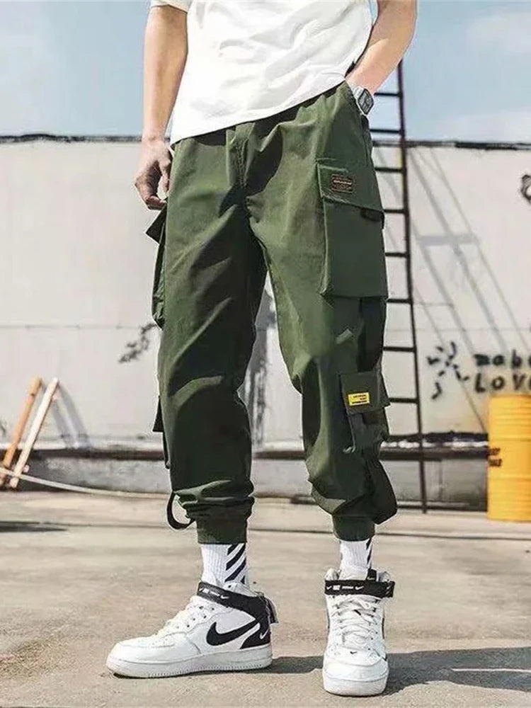 Men’s cargo joggers showing pocket and ribbon detailing