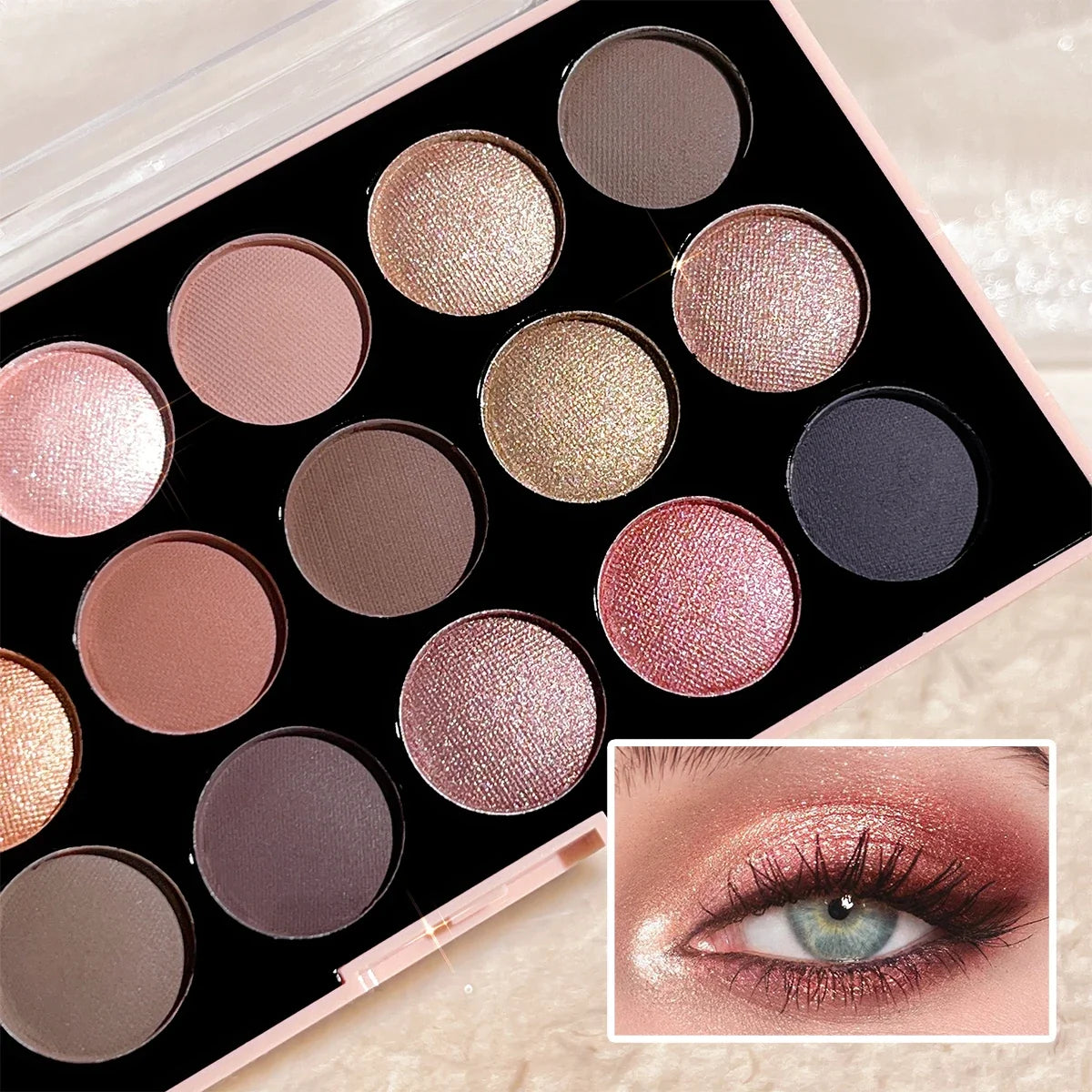 Open 18-color eyeshadow palette showing matte and shimmer shades