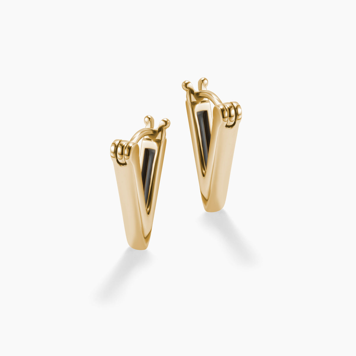The A’s gold huggie earrings front view