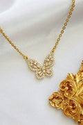24K gold-plated butterfly pendant necklace with cubic zirconia accents