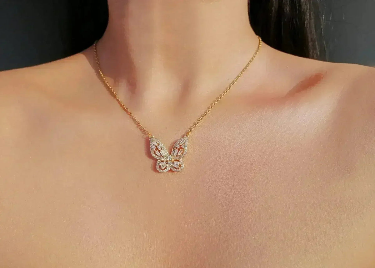 Gold-plated butterfly pendant necklace with cubic zirconia detail