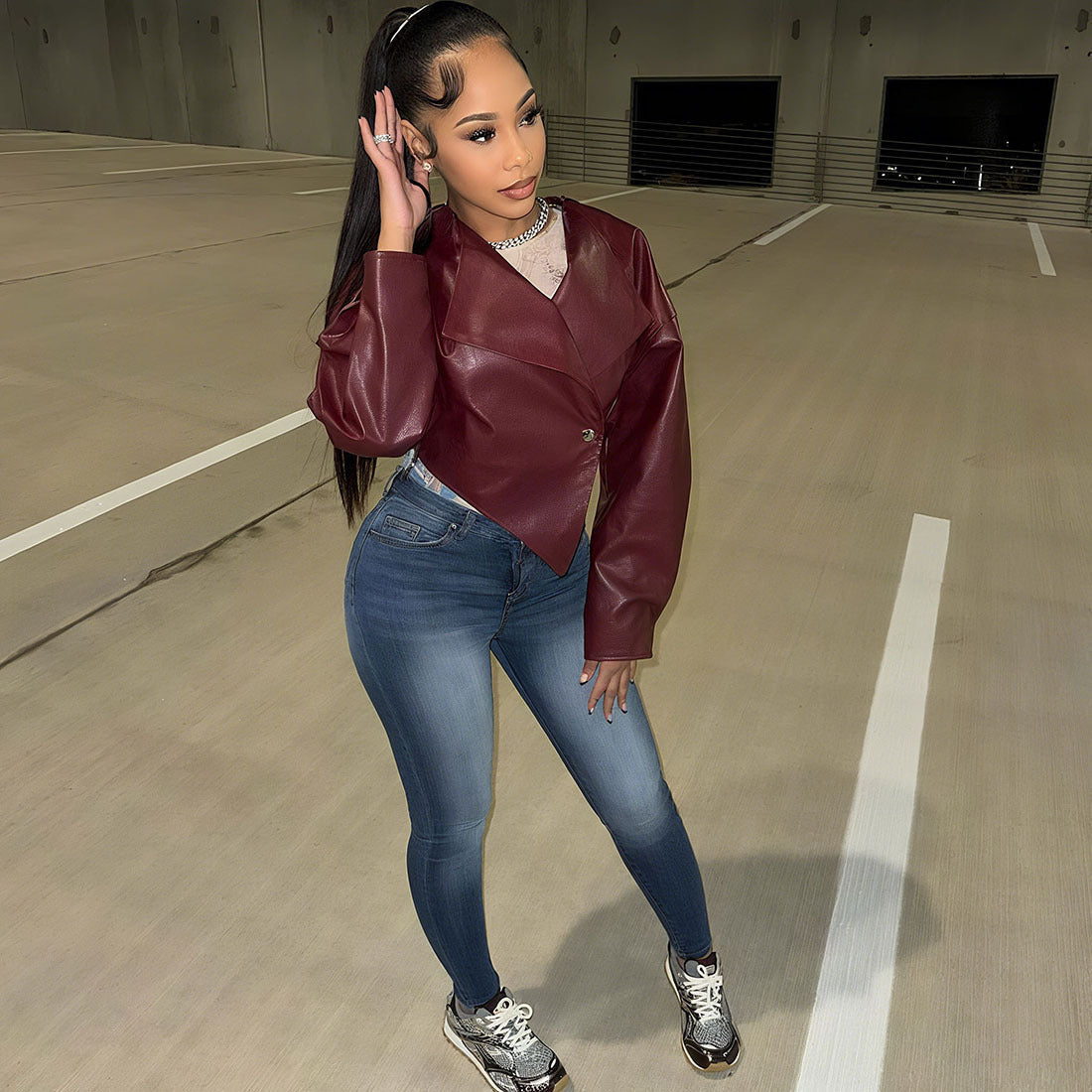 Women’s solid-color PU leather coat by Arivon LLC