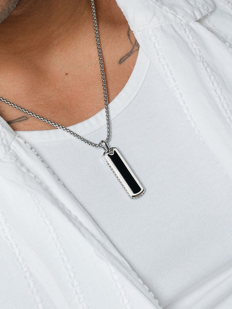 Black onyx column pendant on stainless-steel chain