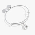 Star and Moon Charm Bangle in shiny silver