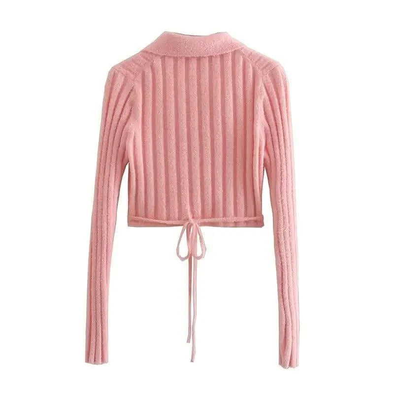 Pink cropped cardigan with feminine bow detail