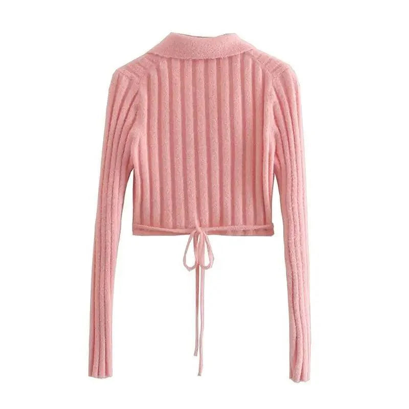 Pink cropped knit cardigan styled on model